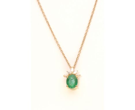 An emerald and diamond pendant
The oval mixed-cut emerald, surmounted by marquise-cut diamonds, mounted in 18ct yellow gold, 