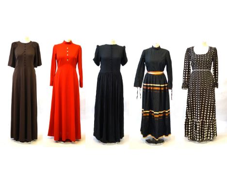 A collection of various vintage dresses
To include a brown floor length dress with front button detailing, a Simon Ellis cott
