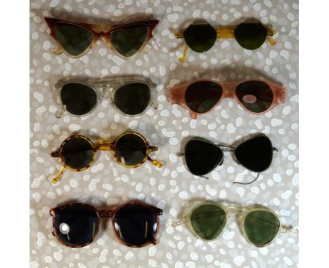 A collection of various vintage sunglasses
To include four pairs of plastic pink, yellow and clear example sunglasses, togeth