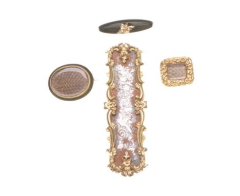 A collection of four Victorian mourning brooches
To include; a yellow metal brooch, of shaped rectangular form, with a braide