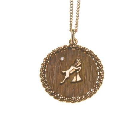 An Aries diamond set pendant
Of circular form, depicting a ram, set with a round brilliant-cut diamond, with a rope twist bor