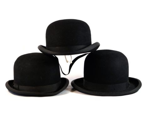 A collection of three vintage black felt bowler hats
Each of typical form, with ribbon detailing, one Christy's and one Dunn 