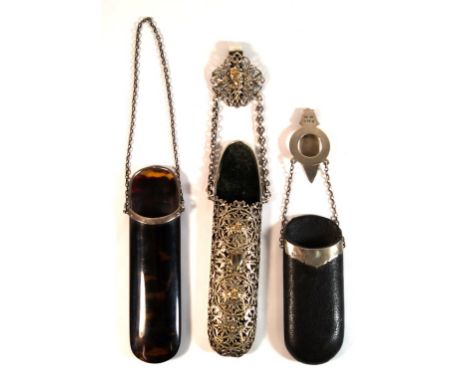 A collection of Victorian spectacles cases 
The first a white metal reticulated example, the rounded rectangular form case, s