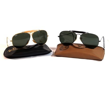 Two pairs of Vintage Ray-Ban Bausch & Lomb sunglasses
To include a pair of bullethole shooters aviators with gold frame and c