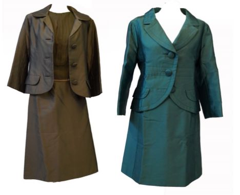 Two Christian Dior 1960s ladies suits 
The first a sea green silk crepe suit, with short buttoned jacket and knee length skir