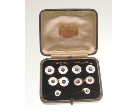 A 9/18ct gold mother of pearl and seed pearl Gent's dress set
Comprising a pair of cufflinks, four buttons and two studs, eac