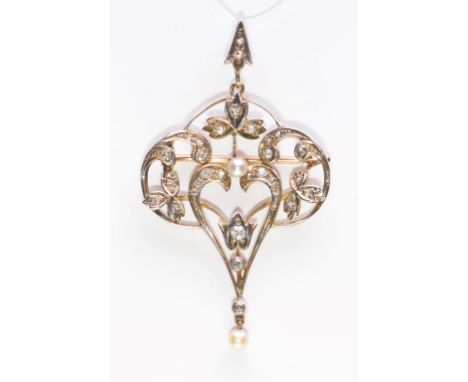 A Victorian diamond set and seed pearl brooch/pendant
Set throughout with old single and brilliant-cut diamonds, with a seed 