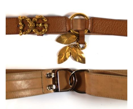 Two leather designer belts 
To include a Christian Dior tan leather belt, with white exposed stitching and silvered 'D' fitti
