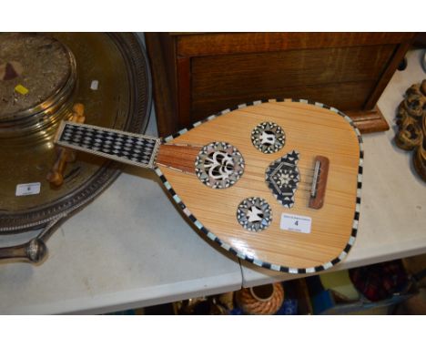 A mother of pearl inlaid Oud