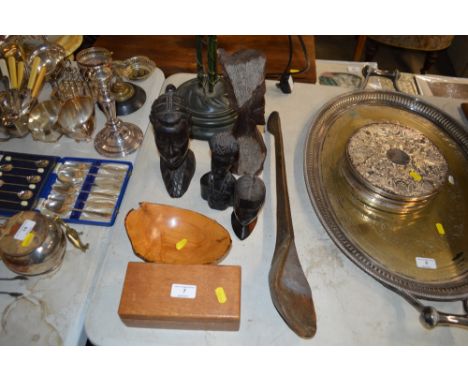 Four various ethnic carved wooden busts; a small wooden trinket box; and a small wooden bowl 