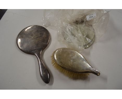 A silver hand mirror and brush  AF