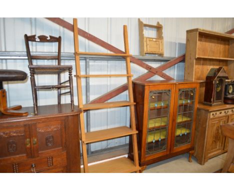A set of John Lewis light oak shelves 
