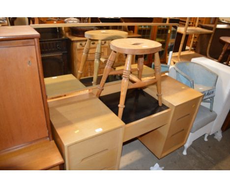 A light oak seven drawer dressing table 