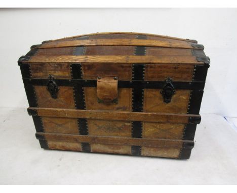 Beautiful Antique dome topped steamer trunk, studded leather detail with wrought iron bands and fixings, castor wheels on eac