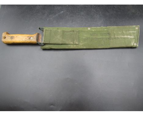 1980 military issued machete  No postage offered on this lot