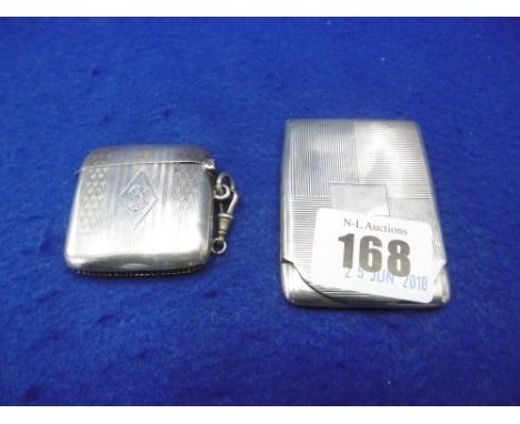 AN ENGINE TURNED HM SILVER VESTA CASE AND ART DECO SILVER MATCH BOX HOLDER