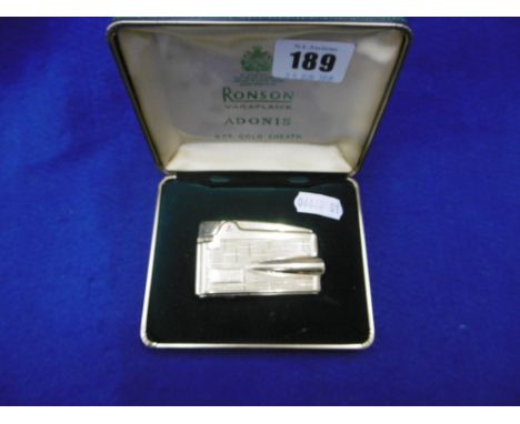 A RONSON ADONIS 9CT GOLD LIGHTER IN ORIGINAL BOX