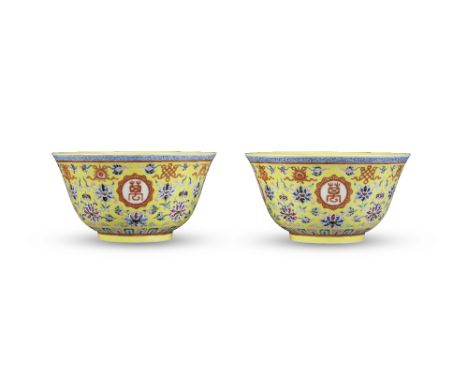 A RARE PAIR OF FAMILLE ROSE YELLOW-GROUND 'WAN SHOU WU JIANG' BAJIXIANG BOWLSJiaqing seal marks and of the periodEach expertl