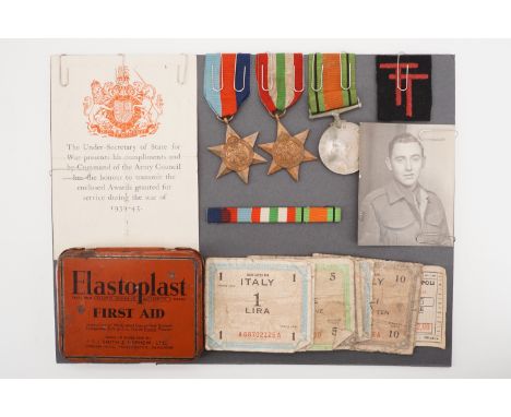 A Second World War campaign medal group including portrait photograph, 50th (Northumbrian) Division cloth formation sign, mil