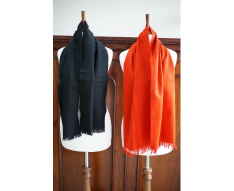 A Jaeger postbox red cashmere and wool scarf and a Scotch House lambs wool scarf in black