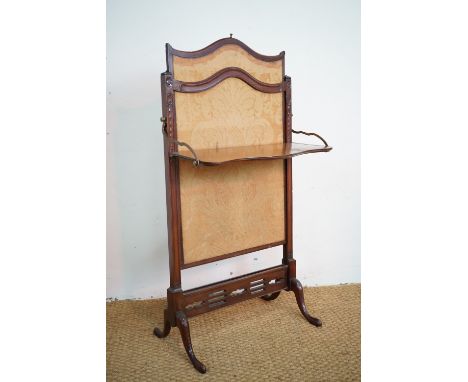 A Victorian carved mahogany adjustable fire screen with folding shelf