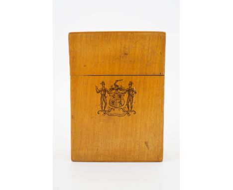A 19th Century Mauchline Ware playing cards box, decorated with a penwork family crest to one face, and a grouse vignette to 