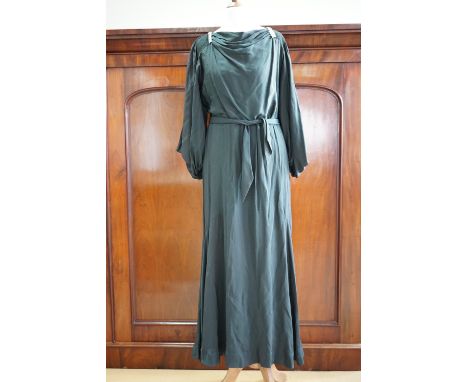 A 1930s dark fern green viscose evening dress with applied diamante double-dress clips, having a bateau neckline with ruched 