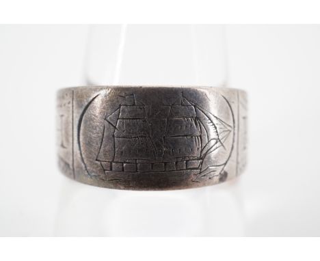 A Georgian gentleman's white metal ring, with engraved sailing ship, flanked by wriggle-work decoration and the letters 'H' a