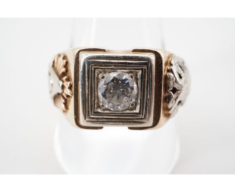 A vintage Masonic diamond ring, with central brilliant-cut diamond of approximately .50ct, claw set within a reeded cell, on 