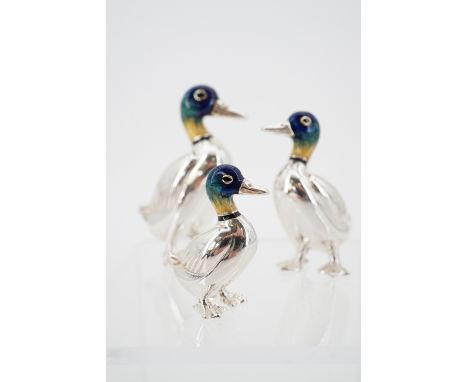 Three Elizabeth II miniature enamelled silver mallard ducks, graded in size, Mark Houghton Ltd of Hatton Garden, Sheffield, 2