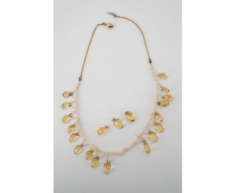 A citrine, seed pearl and yellow-metal fringe necklace, having a seed pearl chain with dependent pendeloque citrines, 19.5g, 