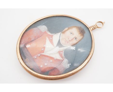 An uncommonly fine Georgian double-faced locket containing a half-length portrait miniature of a British soldier in his redco