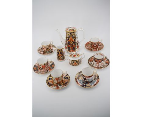 A Royal Crown Derby "Curator's Collection" coffee service comprising coffee pot, cream jug, sucrier, six cans and saucers