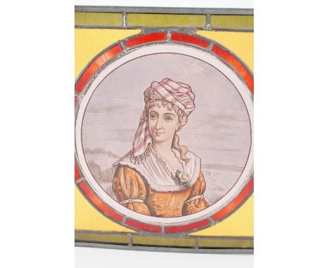 A 19th Century stained glass window by James Page, the central circular pane hand painted with the portrait of a young lady i
