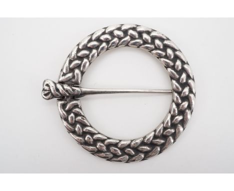 An Alexander Ritchie Iona Scottish silver penannular type brooch, of plaited design, with raised signature to the back 'A E R