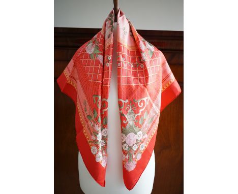 A vintage Hermes 'Jeux de Paille' pattern silk scarf designed by Francoise de la Perriere, in bubblegum pink and fuschia, dep