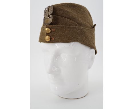 A 1939 dated British Army other rank's Field Service cap with Free Polish Army buttons and cap badge 