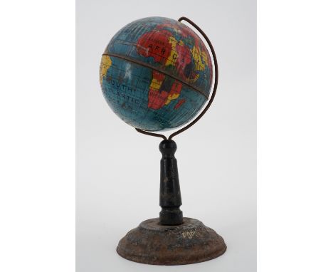 A Lyons Tea "Popular all over the World" tinplate advertising globe on stand, 16 cm