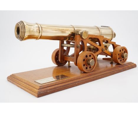 A late 20th Century scale model brass model cannon with plaque inscribed '32 PRD Gun Manufactured 1853 / Model by J R Neate',