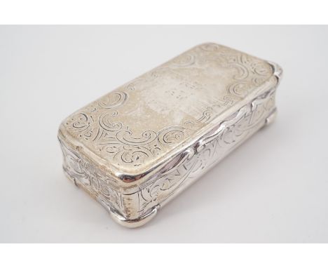 A Victorian silver snuff box, of rounded rectangular section, with engraved foliate decoration, Colen Hewer Cheshire, Birming