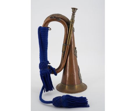 A King's Own Scottish Borderers bugle, bearing applied insignia and stamped with an Ordnance Broad Arrow and "85590 A/SGT J R