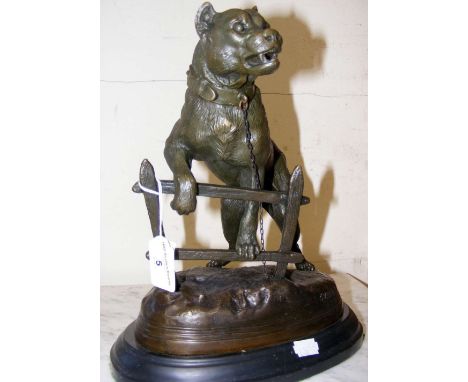 reproduction bronze figure of fierce dog on fence - stamped C.VALTON - 30cm high
