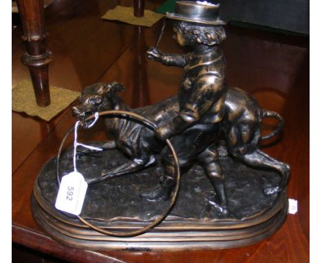 After Jules Moigniez - a reproduction bronze group of boy with dog and hoop