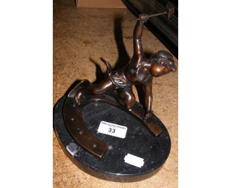 Bronze cherub on marble plinth