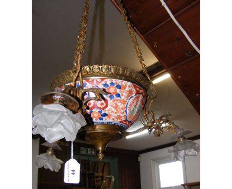 An Imari and gilt ceiling light with glass flower shades