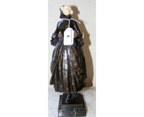 A bronze and ivory figure of a woman - signed F Lugerth - on marble base - 31cm high overall