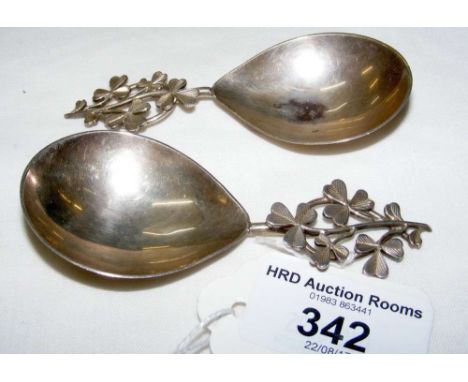 Pair of silver caddy spoons having shamrock handles