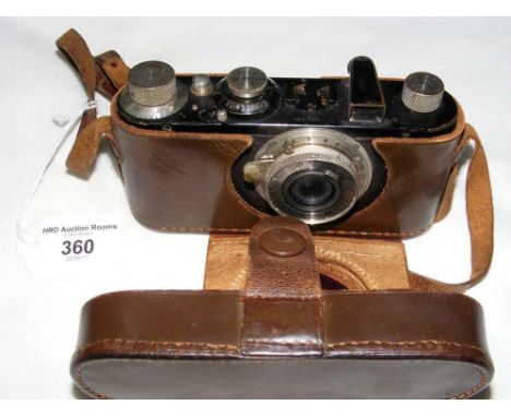 A Leica I black finish camera No.64324 with Leitz lens and leather carrying case