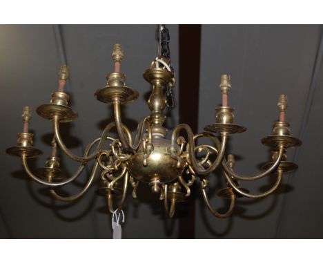 A Dutch style brass ten light hanging electrolier 