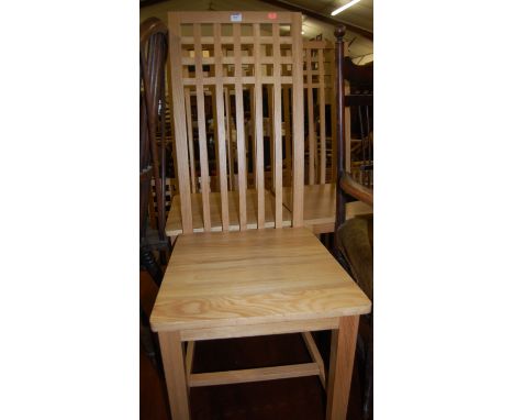 A contemporary set of six light oak panelled seat slatback dining chairs in the manner of MacIntosh 
